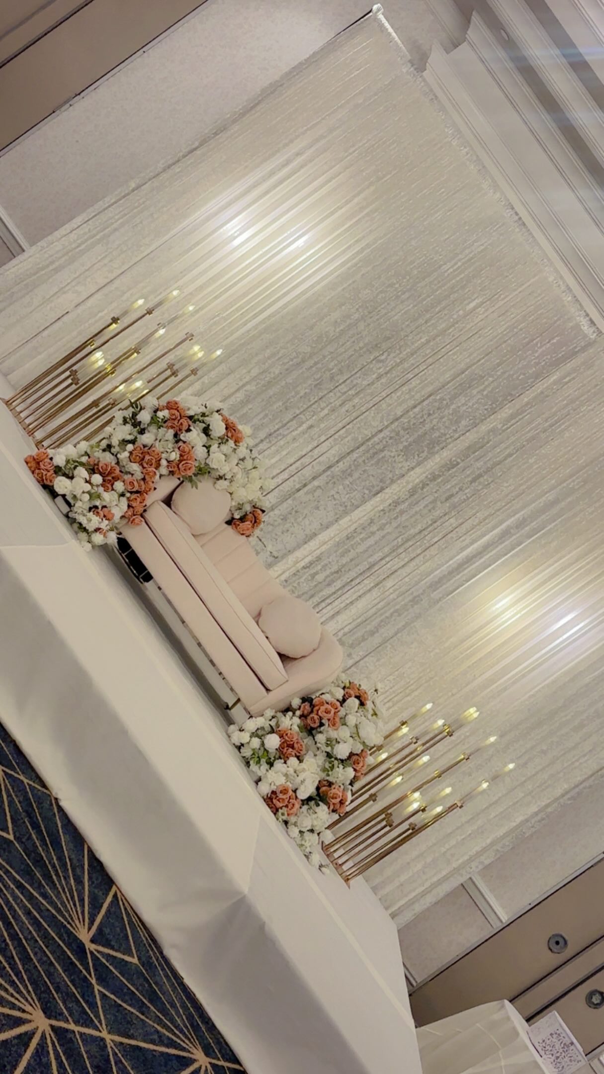 Blush florals and ivory draping from an Adore reception